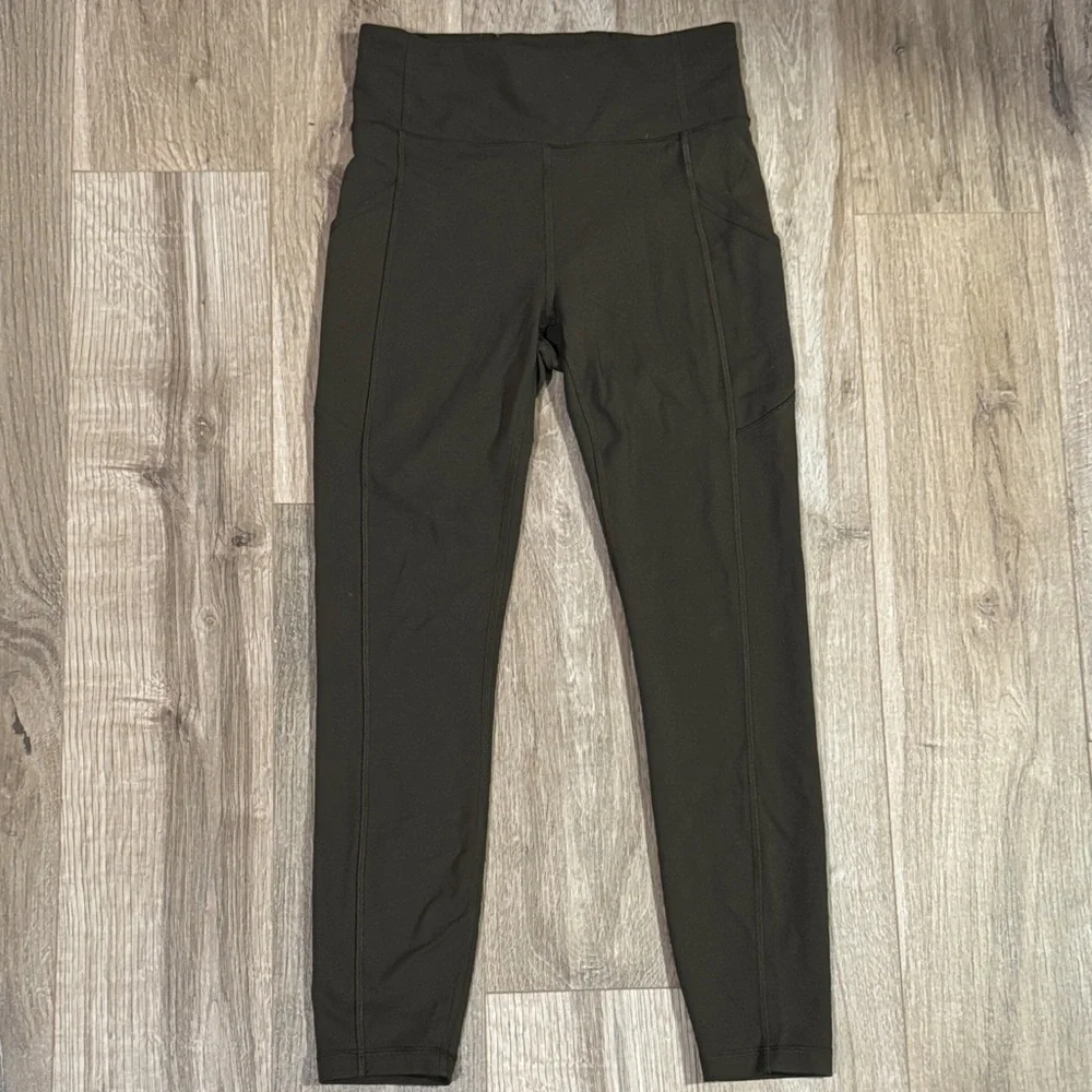 Lululemon Women's High-Waisted Crop leggings Dark Olive with Side Pockets Sz 6